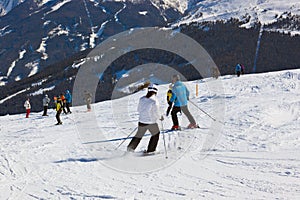 Skiers at mountains ski resort Bad Gastein Austria photo