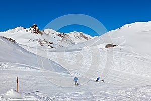 Skiers at mountains ski resort Bad Hofgastein - Austria photo