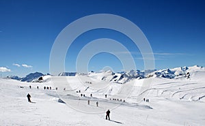 Skiers on mountainside