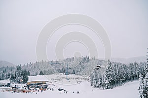 Skiers ride along the slope of the Kolasin 1600 ski resort. Montenegro