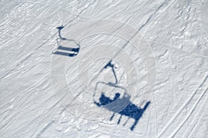 Skiers on a ski lift