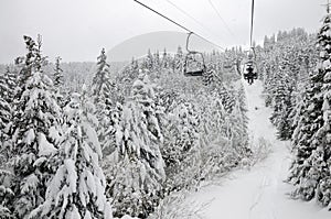 Skiers on a ski-lift