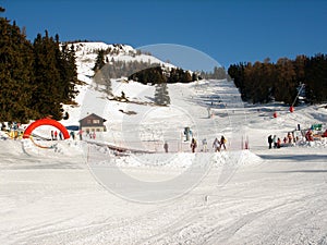 Skiers on ski resort slopes