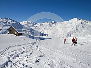 Skiers on a ski slope