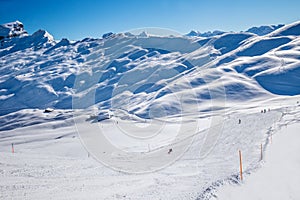 Skiers on the ski slopes in Hoch-Ybrig ski resort, Canton Schwyz, Central Switzerland