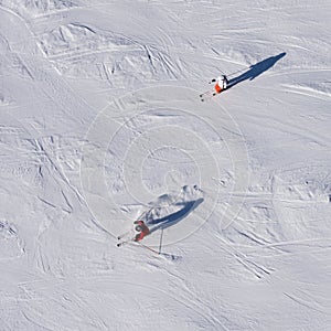 Skiers skiing, top view