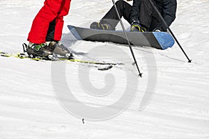 skiers on a snow slope for beginners on a sunny day. active