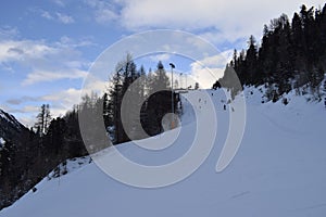 Skiers and snowboarders in Austrian ski resort Hochgurgl