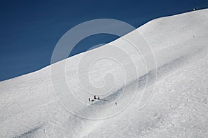 Skiers on wide track