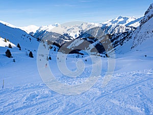 Skiing with amazing view of french famous mountains in beautiful winter snow 3 vallees France, Meribel. 2018. Blue sky and a lot o