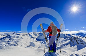 Skiing with amazing view of swiss famous mountains in beautiful photo