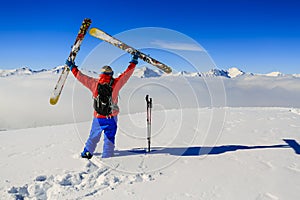 Skiing with amazing view of swiss famous mountains in beautiful photo