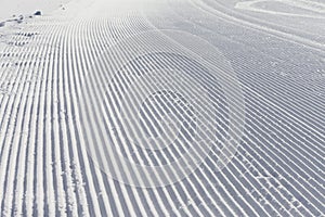 Skiing background - fresh snow on ski slope