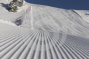 Skiing background - fresh snow on ski slope