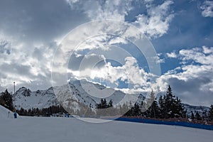 Skiing below the clouds