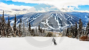 Skiing down to the village of Sun Peaks