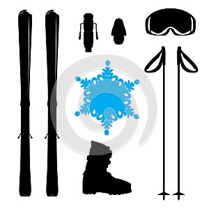 Skiing equipment silhouette with snowflake