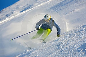 Skiing on fresh snow at winter season