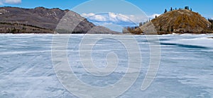 Skiing on Frozen Lake Laberge, Yukon, Canada