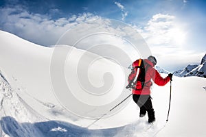 Skiing: male skier in powder snow