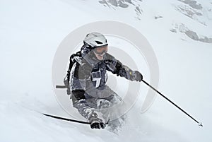 Skiing (Man in grey ski suit)