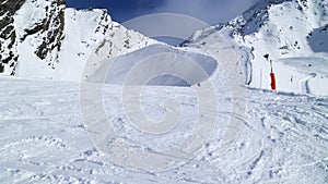 Skiing on mogul slope in alpine resort Les Arcs