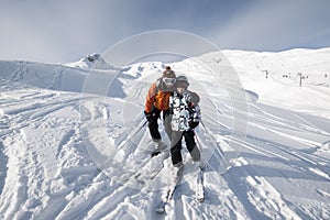 Skiing, mother and child