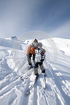 Skiing, mother and child