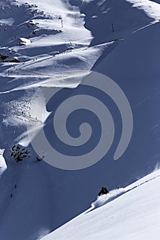 Extreme skier skiing down the hill