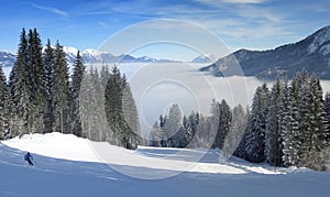 Skiing over the clouds panorama