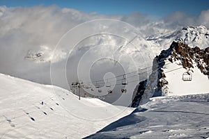 Skiing resort with a chair lift and view of mountains, Serre Chevalier, France photo