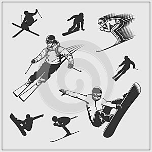 Skiing set. Silhouettes of skiers and snowboarders. photo