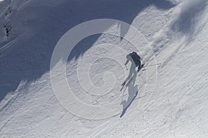 Skiing in the snowy mountains, winter freeride extreme sport