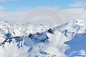 Skiing tracks on mountain slopes in Paradiski region
