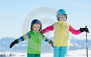 Skiing, winter fun,smiling children enjoying ski holiday on a s