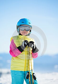 Skiing, winter fun, sport -portrait of smiling skier girl