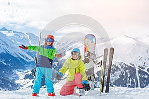 Skiing, winter, snow, sun and fun - kids, boy and girl having fun in the Alps. Child skiing in the mountains.