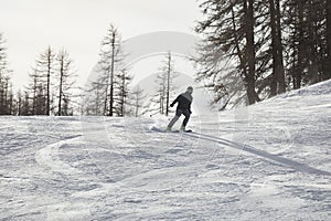 Skiing in the winter snowy slopes