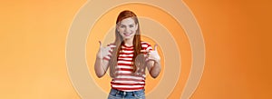 Skilful good-looking redhead motivated girl, pointing herself, indicate fingers chest, bragging joyfully smiling