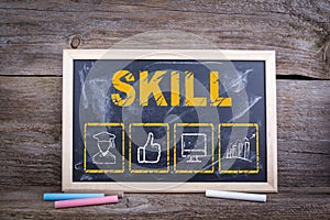 Skill Business concept. Chalk board Background