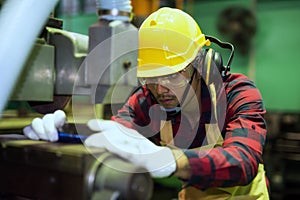 Skill technician worker on manual lathe machine