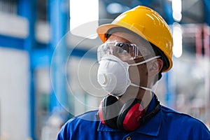 Skilled Asian worker with protective mask