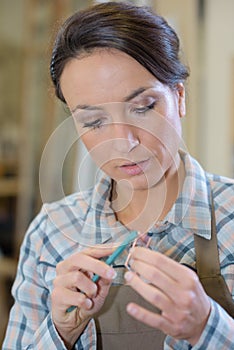 Skilled blonde woman jewellery