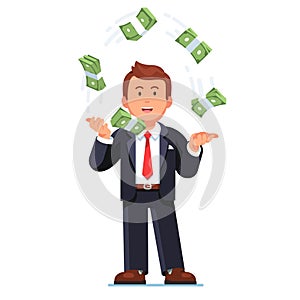 Skilled business man standing juggling money cash