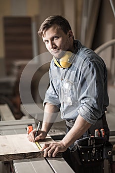 Skilled carpenter in workshop