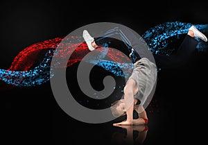 Skilled male dancer balancing on his forearms