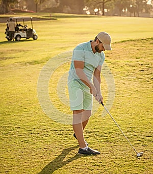 skilled man playing game on green grass. summer activity. professional sport outdoor.