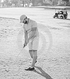 skilled man playing game on green grass. summer activity. professional sport outdoor.