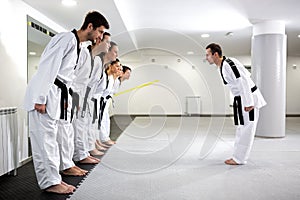 Skilled martial artists preparing to begin training