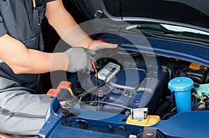 Skilled Technician Hands: Car Mechanic Working on Auto Repairs.